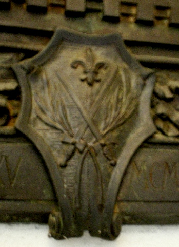 Primi XX sec.- Sondrio, stemma nella cornice di una formella in bronzo posta su una parete del cortile del municipio.